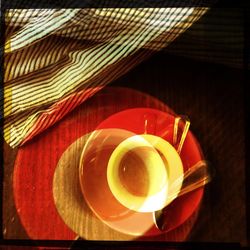 High angle view of coffee cup on table