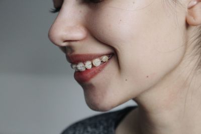 Close-up portrait of smiling mid adult woman