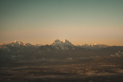 Scenic view of mountains against sky during sunset