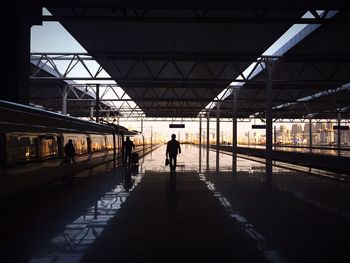 People at railroad station