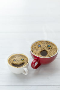 Close-up of coffee cup on table