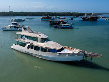 High angle view of an abandoned boat at anchor.