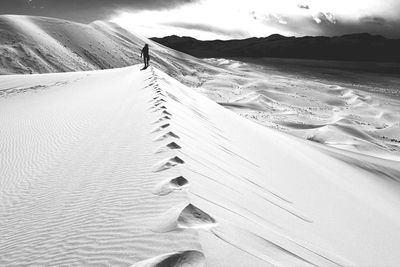 Person walking at eureka valley sand dunes
