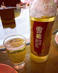 Close-up of beer glass on table