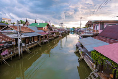 Boats moored at harbor