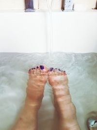 Low section of legs in water