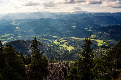 Scenic view of landscape and mountains against sky