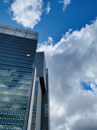 Low angle view of modern buildings against sky