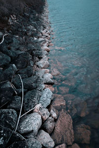 High angle view of rocks on shore