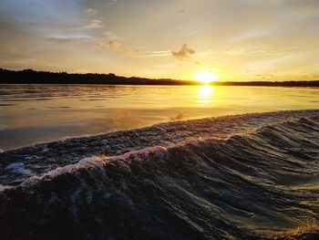 Scenic view of sea against sky during sunset