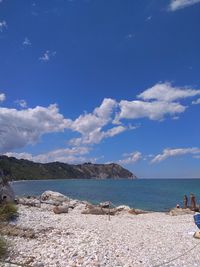 Scenic view of sea against blue sky