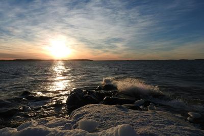 Scenic view of sea against sky during sunset