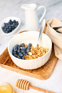 Homemade granola with nuts and fresh berries for breakfast. proper balanced nutrition. 