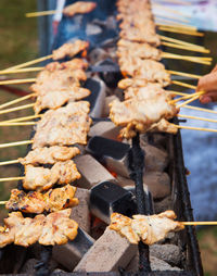 Close-up of meat on barbecue grill