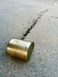 Close-up of manhole on footpath