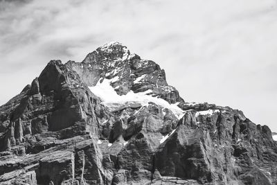 Scenic view of snowcapped mountain against sky