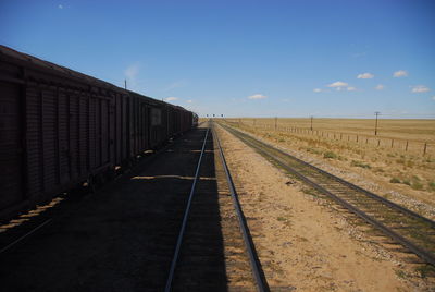 Railroad tracks against sky