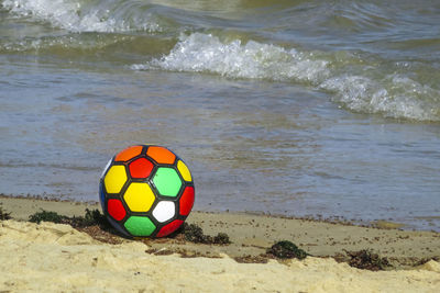 Close-up of ball on beach