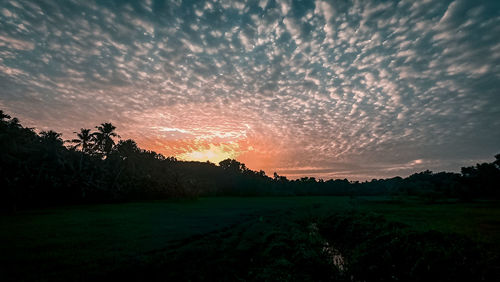 Scenic view of silhouette landscape against sky during sunset