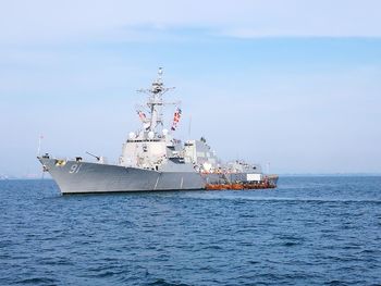 Ship in sea against sky