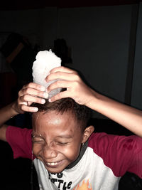 Portrait of man holding ice cream