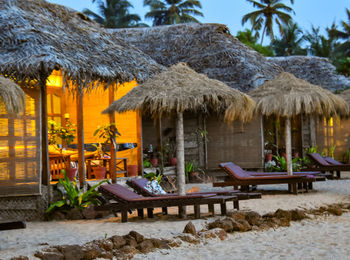 Built structure with trees in foreground