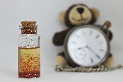 Close-up of clock on table