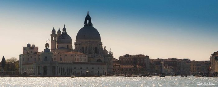 Church of san giorgio maggiore in grand canal against clear sky