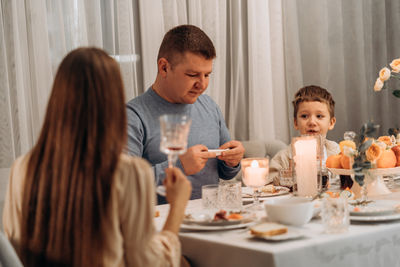 Female friends having food at home