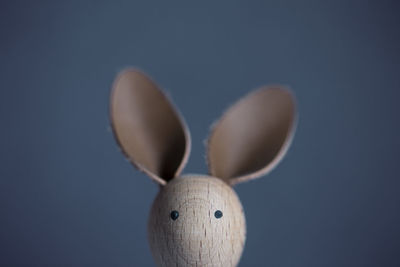 Close-up of stuffed toy against gray background