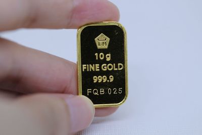 Close-up of hand holding text