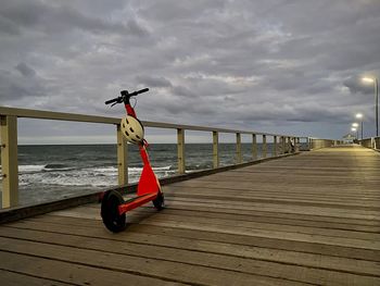 Pier on sea against sky