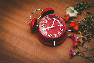 High angle view of clock on table