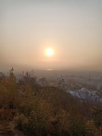 Scenic view of landscape against sky during sunset