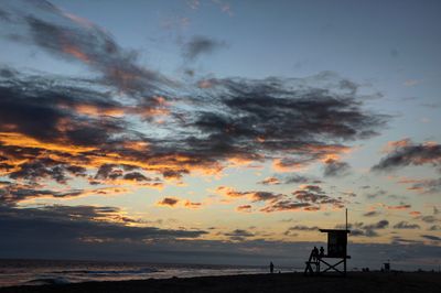 Silhouette of beach at sunset