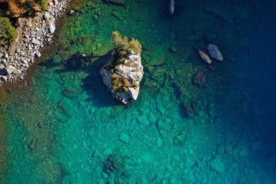 High angle view of rock formation in sea