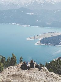 High angle view of people looking at lake