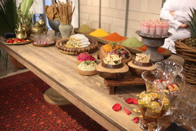 Various cake on table at store