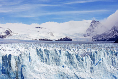 Scenic view of frozen sea against sky