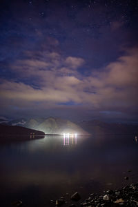 Scenic view of sea against sky at night