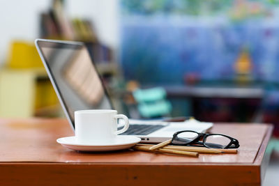 Coffee cup on table