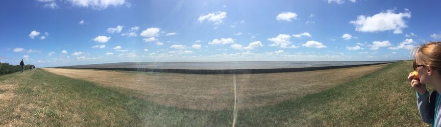 Scenic view of land against sky