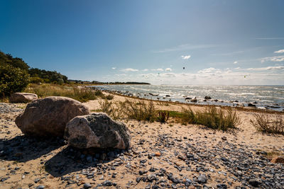 Scenic view of beach against sky