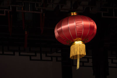 Close-up of illuminated light bulb