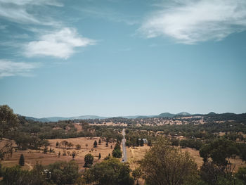 Panoramic view of buildings in city against sky