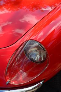 Close-up of red vintage car