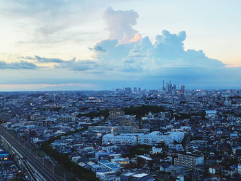 High angle view of buildings against sky during sunset