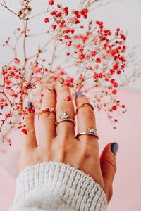 Baby's breath. suggestion. woman's hand with jewelry rings. jewelry and luxury concept. beautiful 