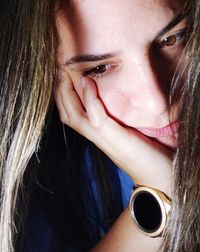 Close-up of thoughtful woman looking away