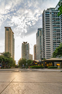 Street amidst buildings against sky